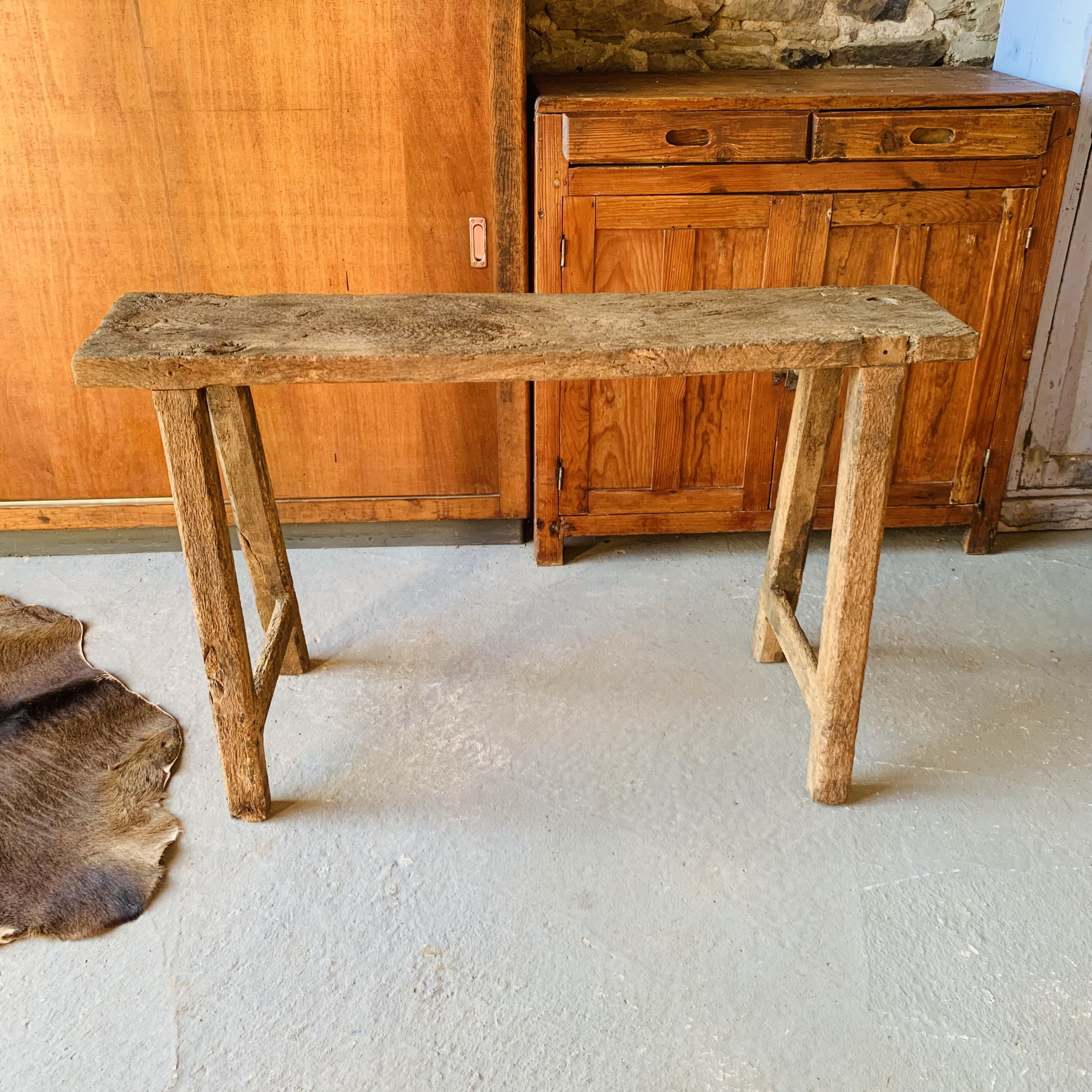Primitive raw wood console