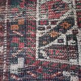 Ancien tapis en laine fait main