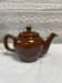 Brown glazed ceramic teapot
