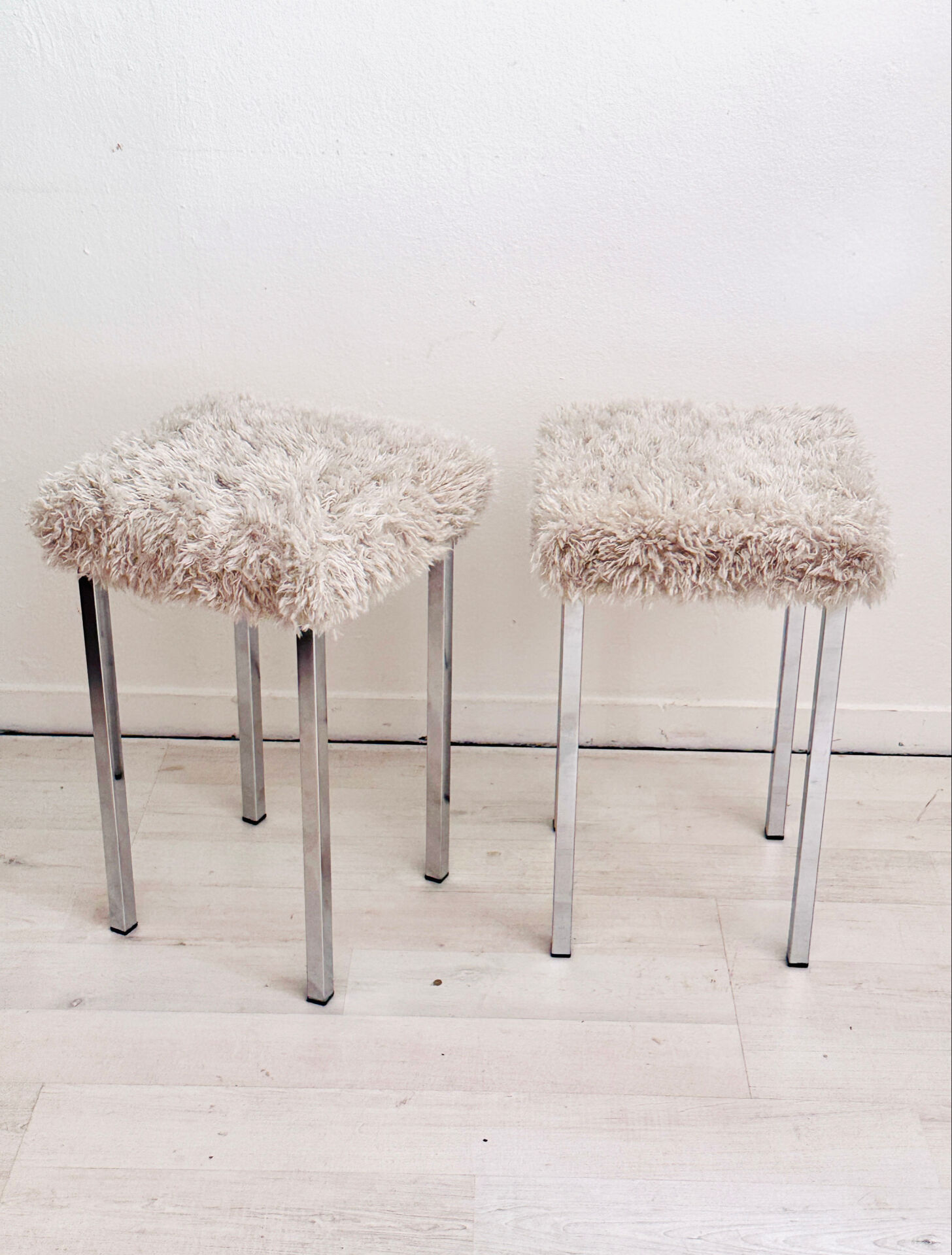 Set of two vintage chrome stools with fluffy upholstery