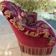 Velvet toad with backrest and firm seat in burgundy red color