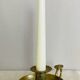 20th century chiseled brass socket candle holder representing Horsemen in armor