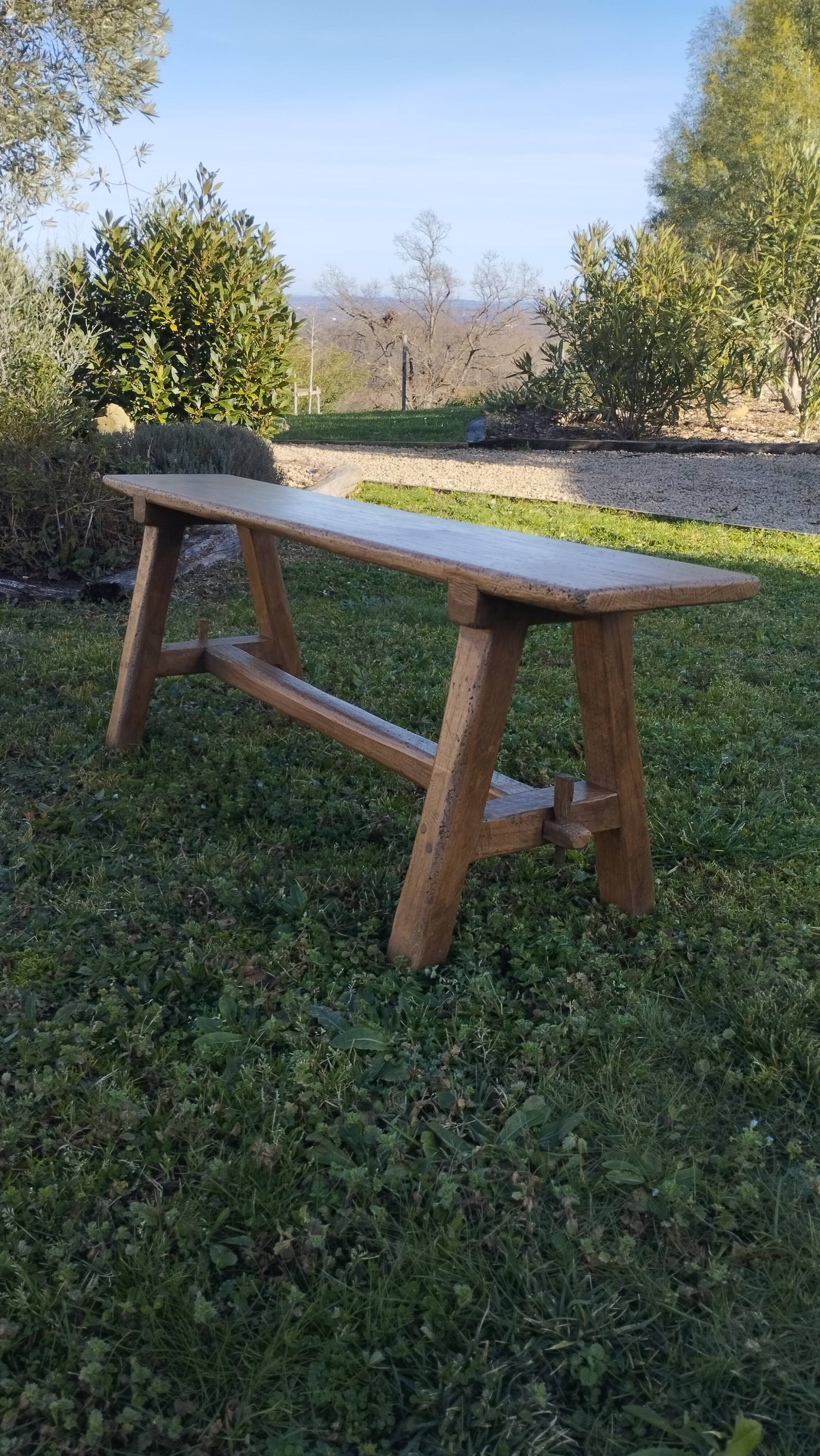 "A frame" bench in solid oak, patinated.