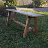 "A frame" bench in solid oak, patinated.