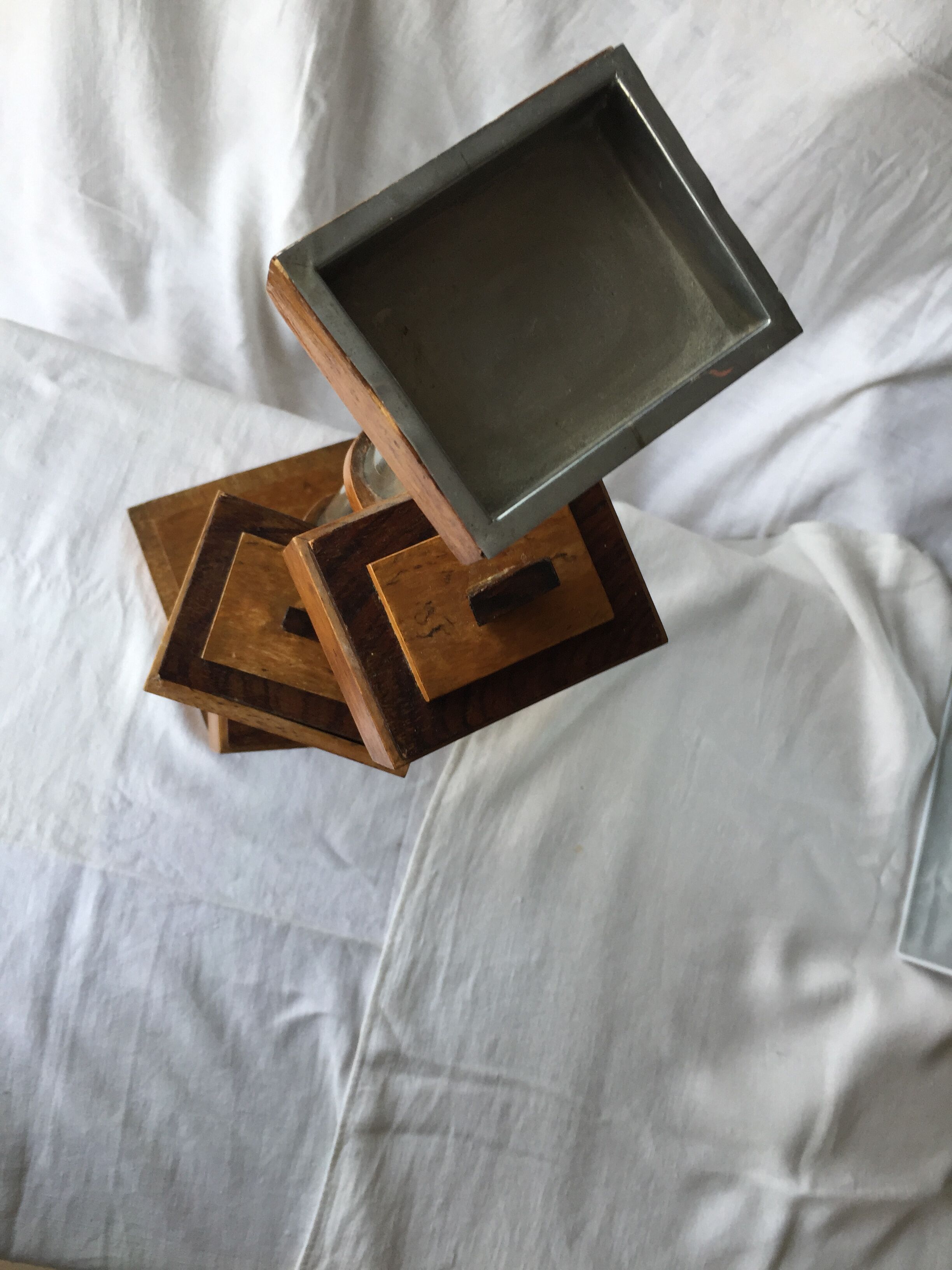 Small 1930s wooden and glass furniture with sliding storage boxes