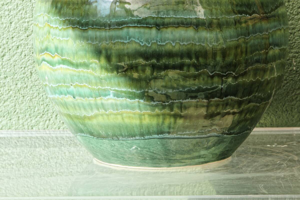 Glazed ceramic ball lamp base, green gradients.