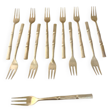 12 small gold dessert forks, Hollywood Regency – circa 1
