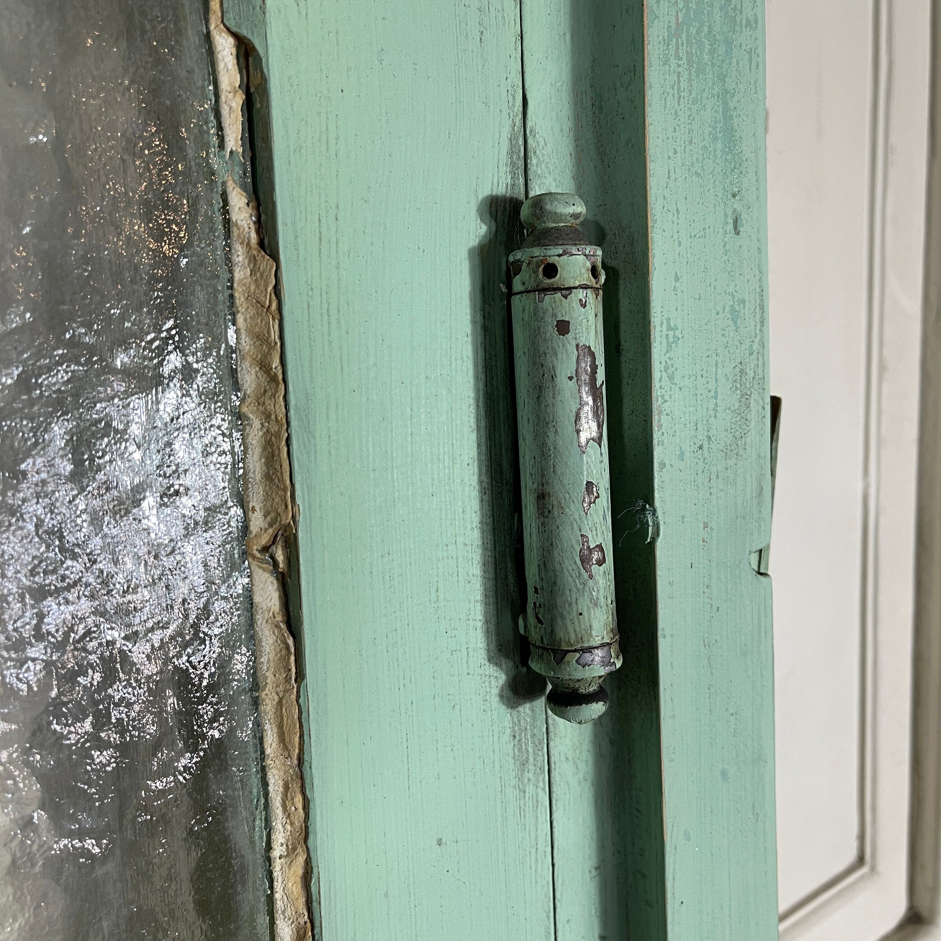 Old pair of saloon type glass doors