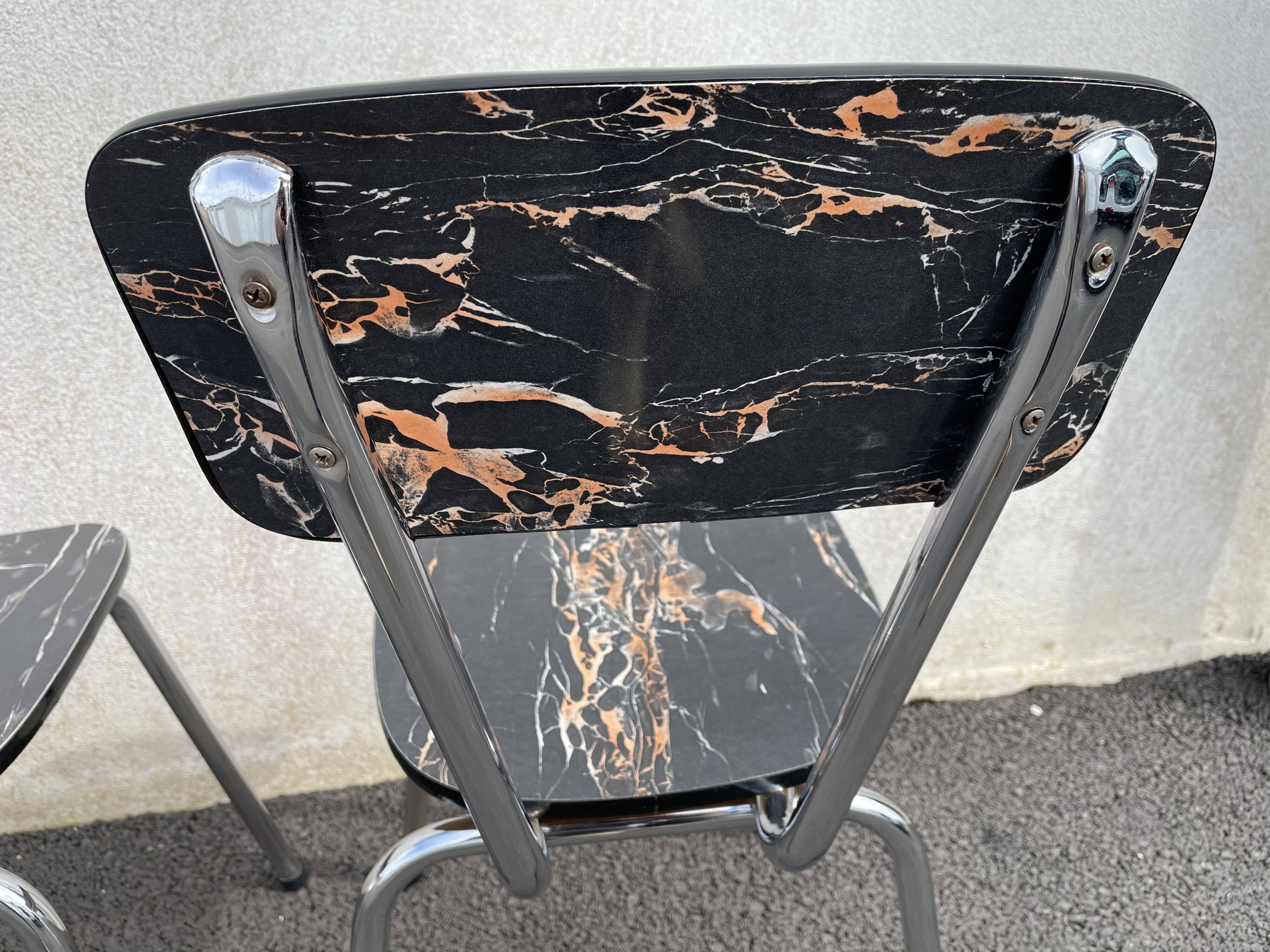 Black marbled formica chairs