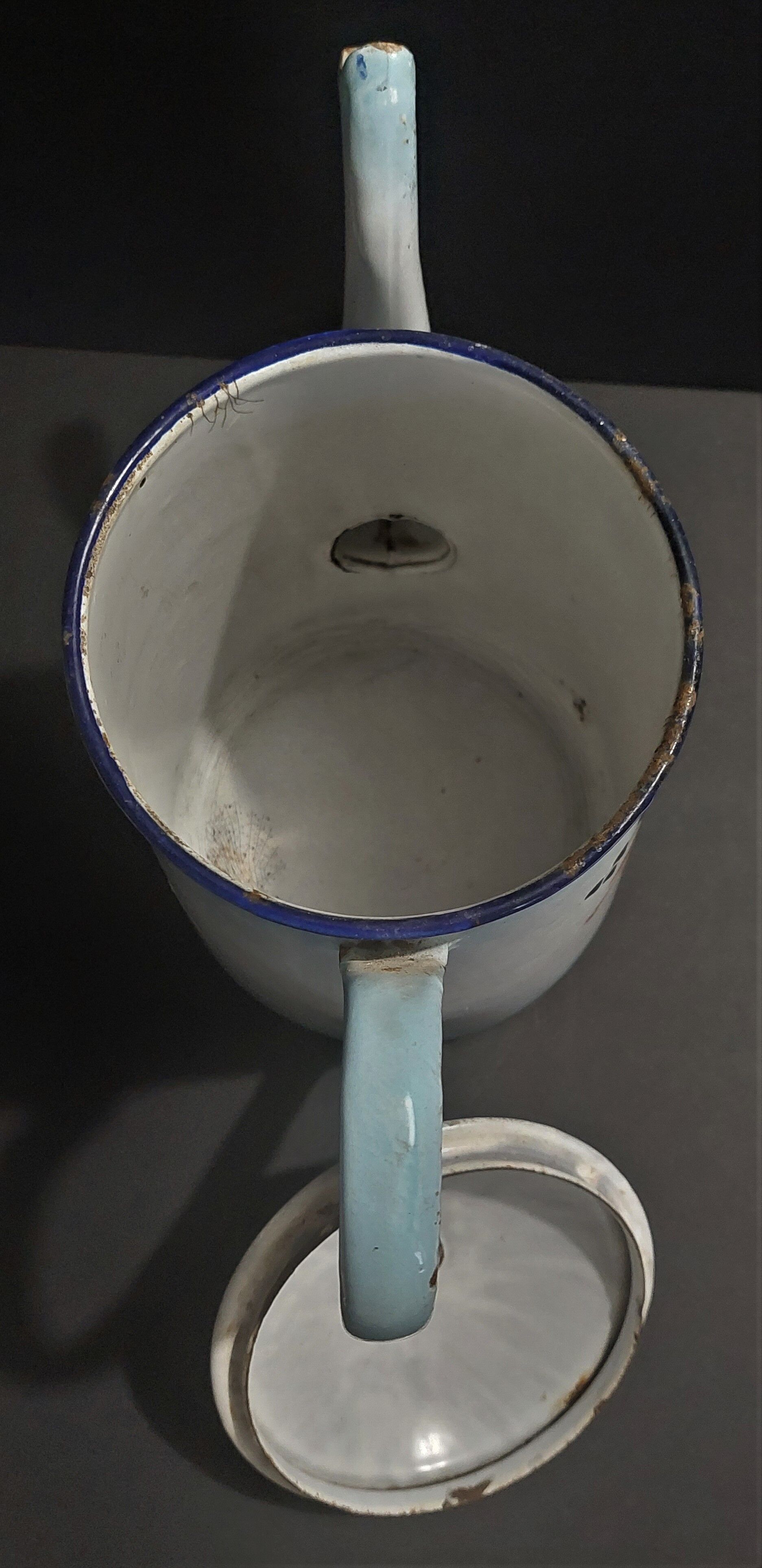 Enamelled sheet metal pourer decorated with black berries early twentieth century