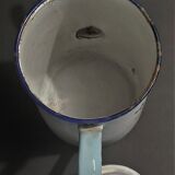 Enamelled sheet metal pourer decorated with black berries early twentieth century