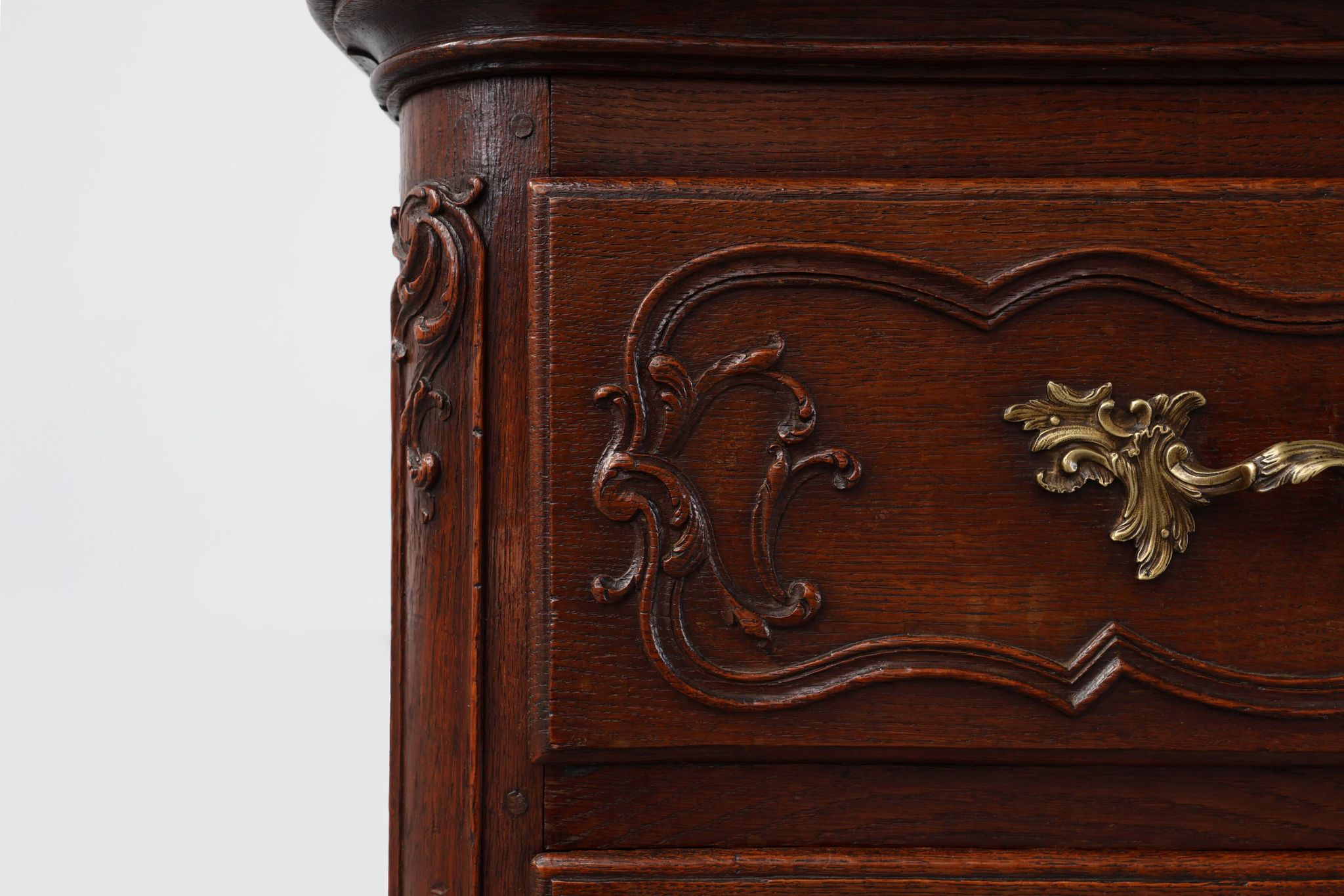 French 18th Century hand crafted oak chest of drawers in Louis XV style