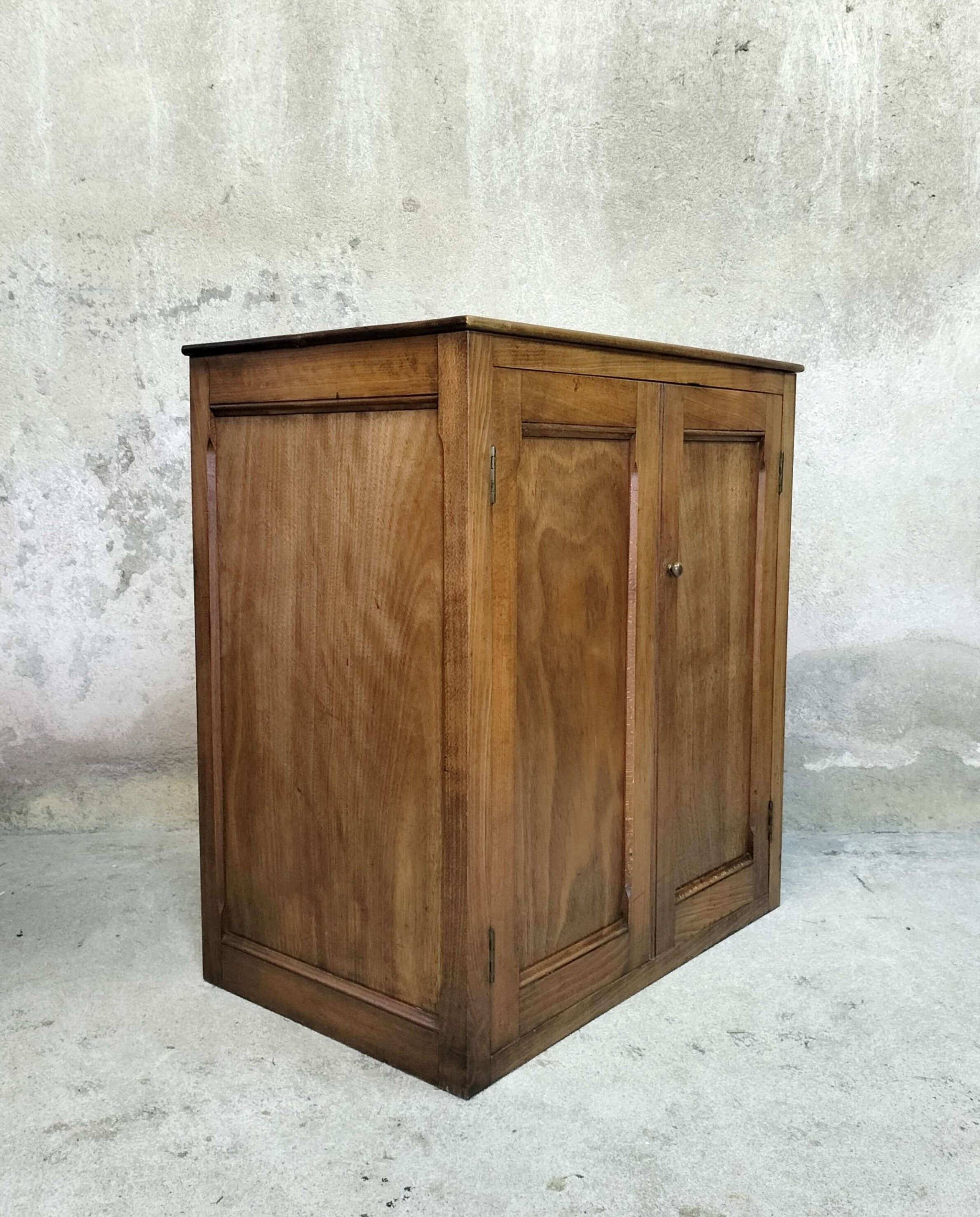 Small wooden sideboard with two doors.