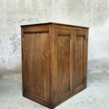 Small wooden sideboard with two doors.