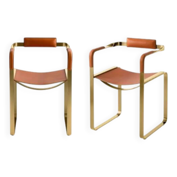 Pair of Wanderlust armchairs in brown and gold brass