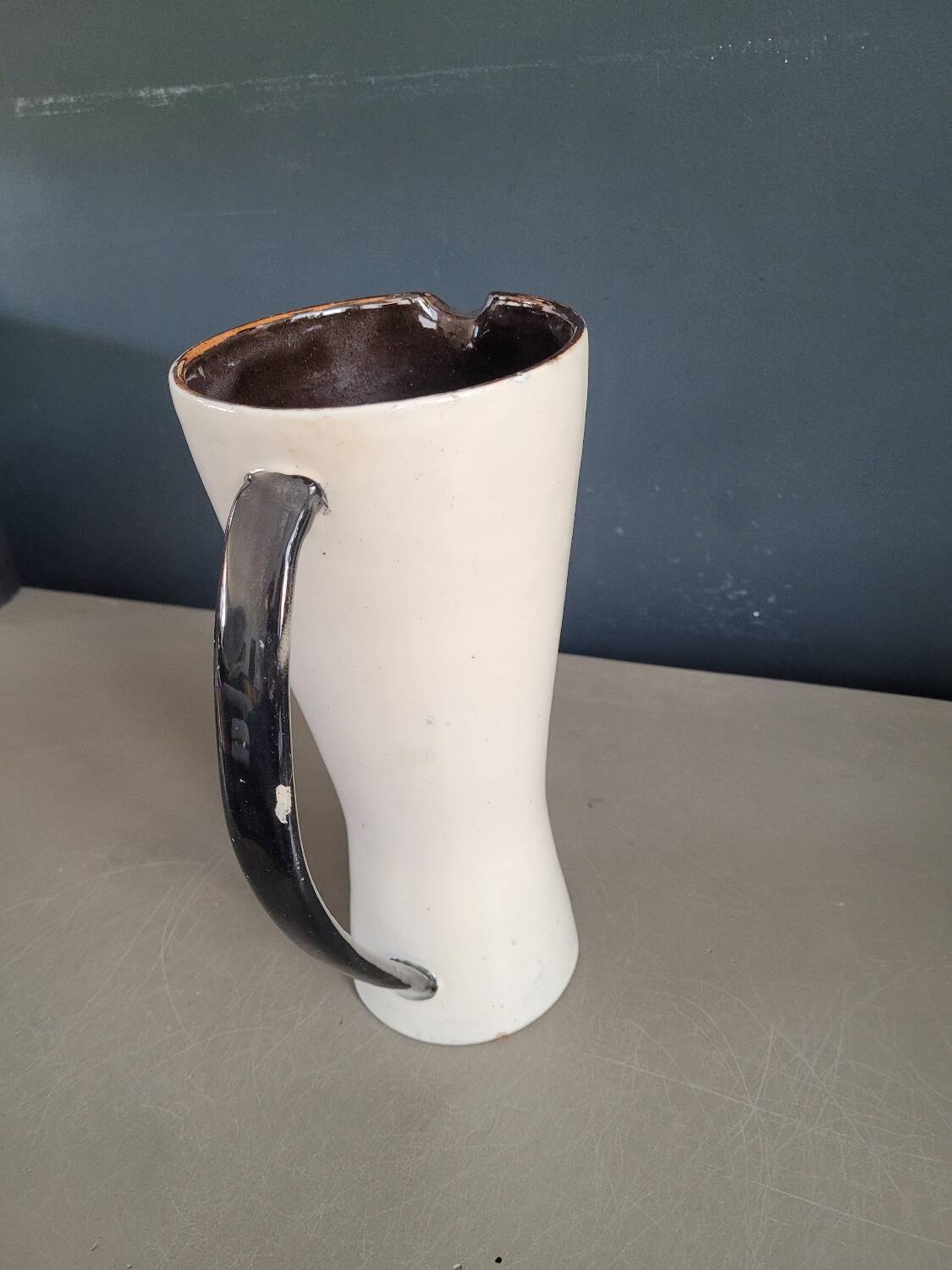 Vintage black and white diabolo pitcher
