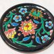 Ensemble émaux de Longwy dessous de plat et de bouteille décor floral