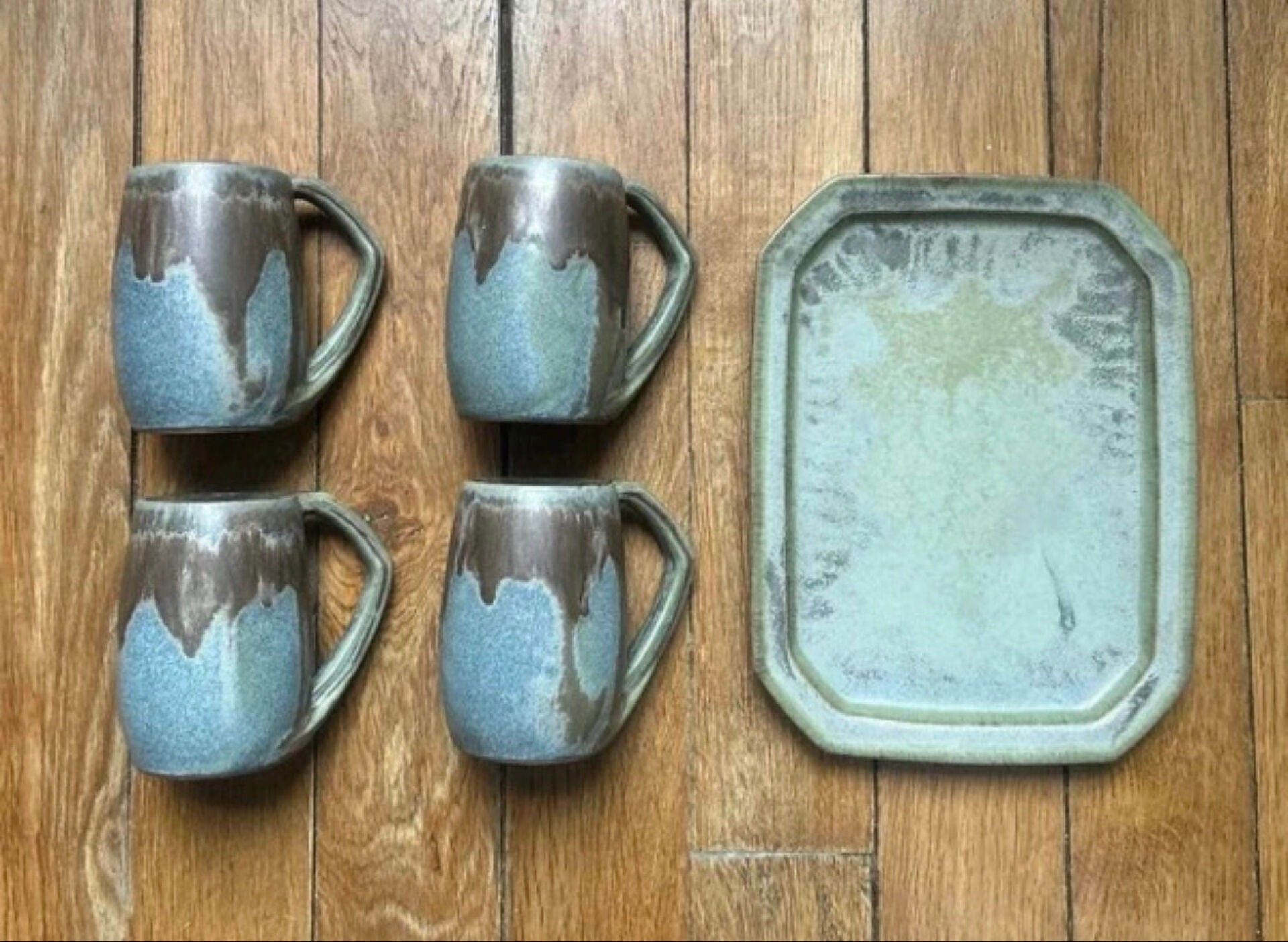 Set of 4 cups and 1 signed brutalist tray.