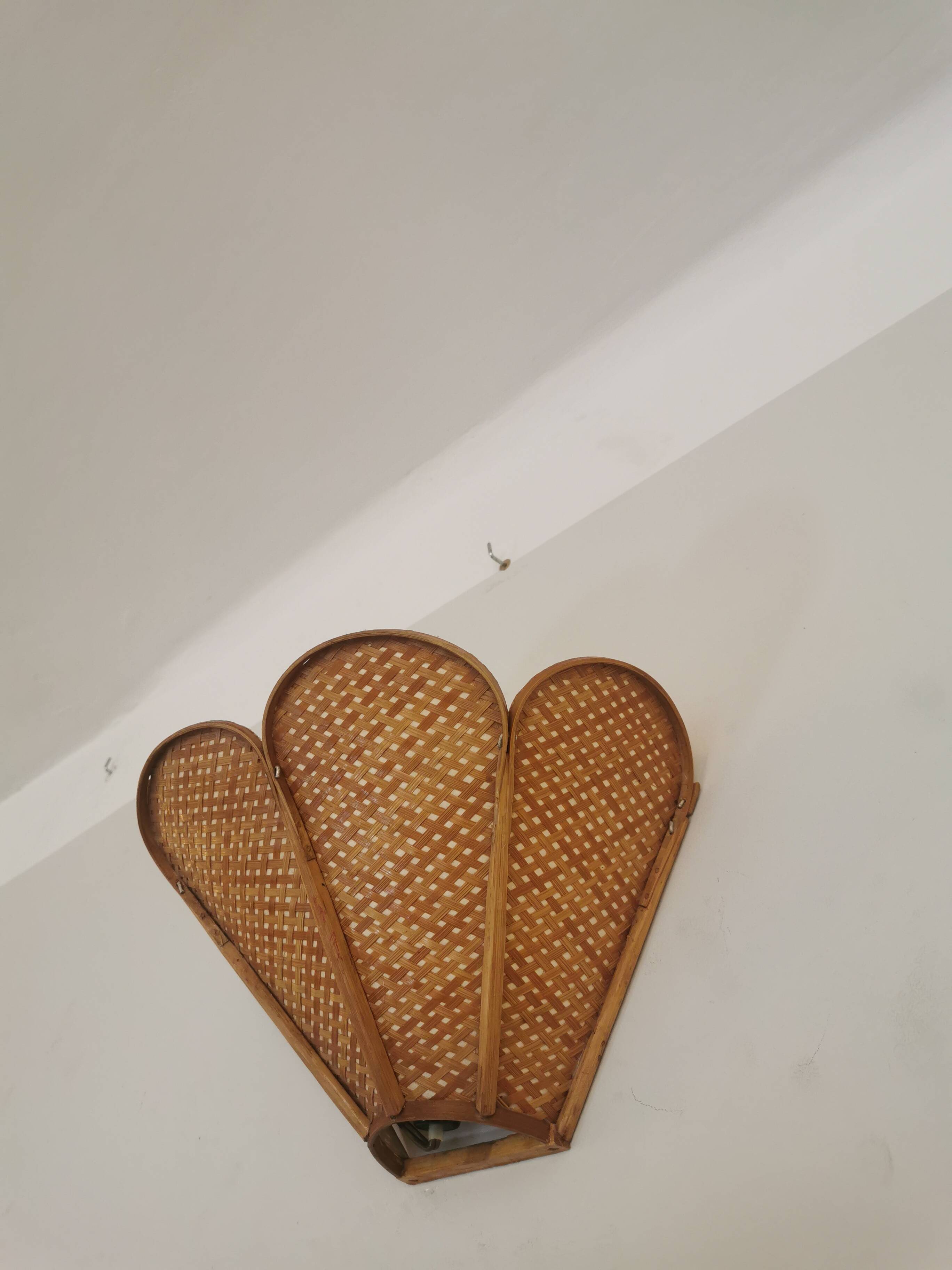 Pair of vintage "tulip" wall lights in rattan and canework