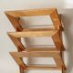 Wall-mounted magazine rack in varnished plywood, 80s/90s
