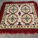 Tapis vintage en laine et frange