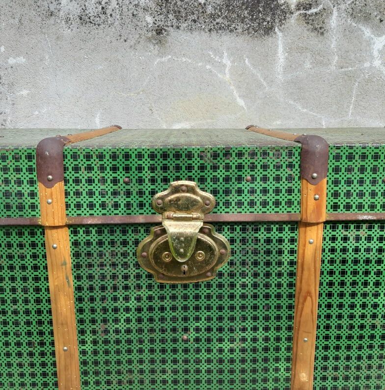 Vintage green metal trunk