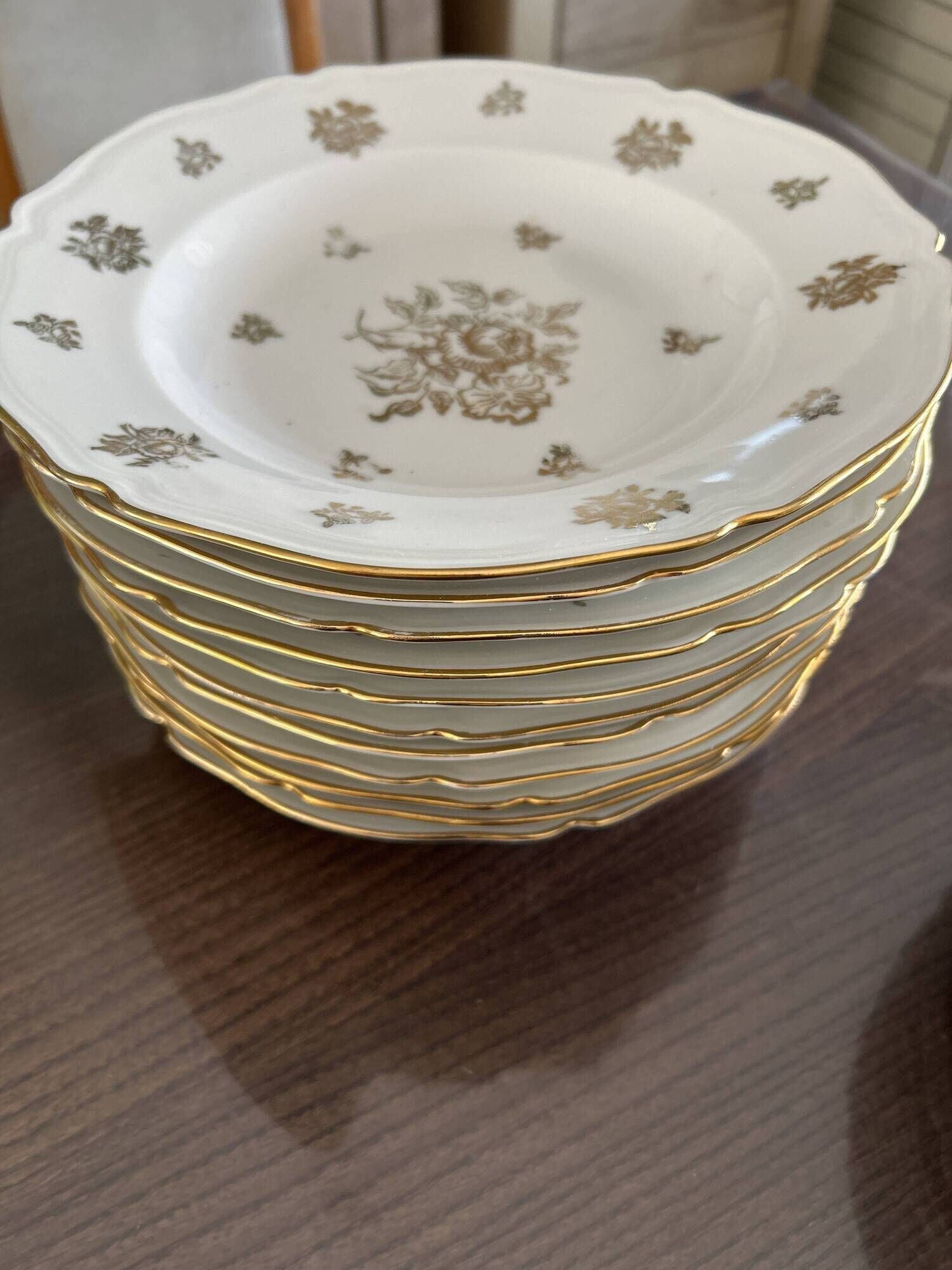 This white porcelain plate features a scalloped edge and elegance.