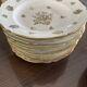 This white porcelain plate features a scalloped edge and elegance.
