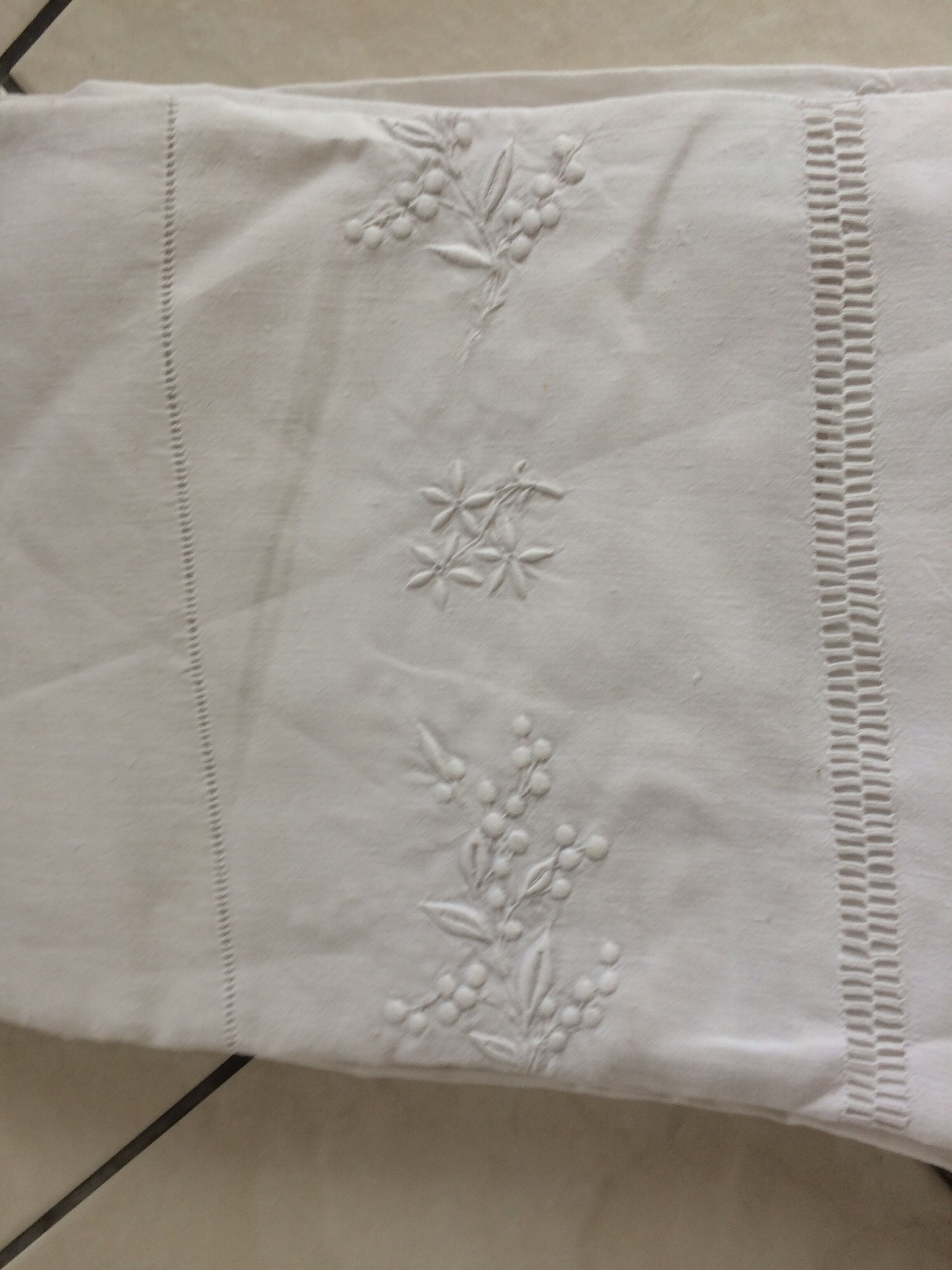 Antique linen sheet with days, embroideries and monograms worked