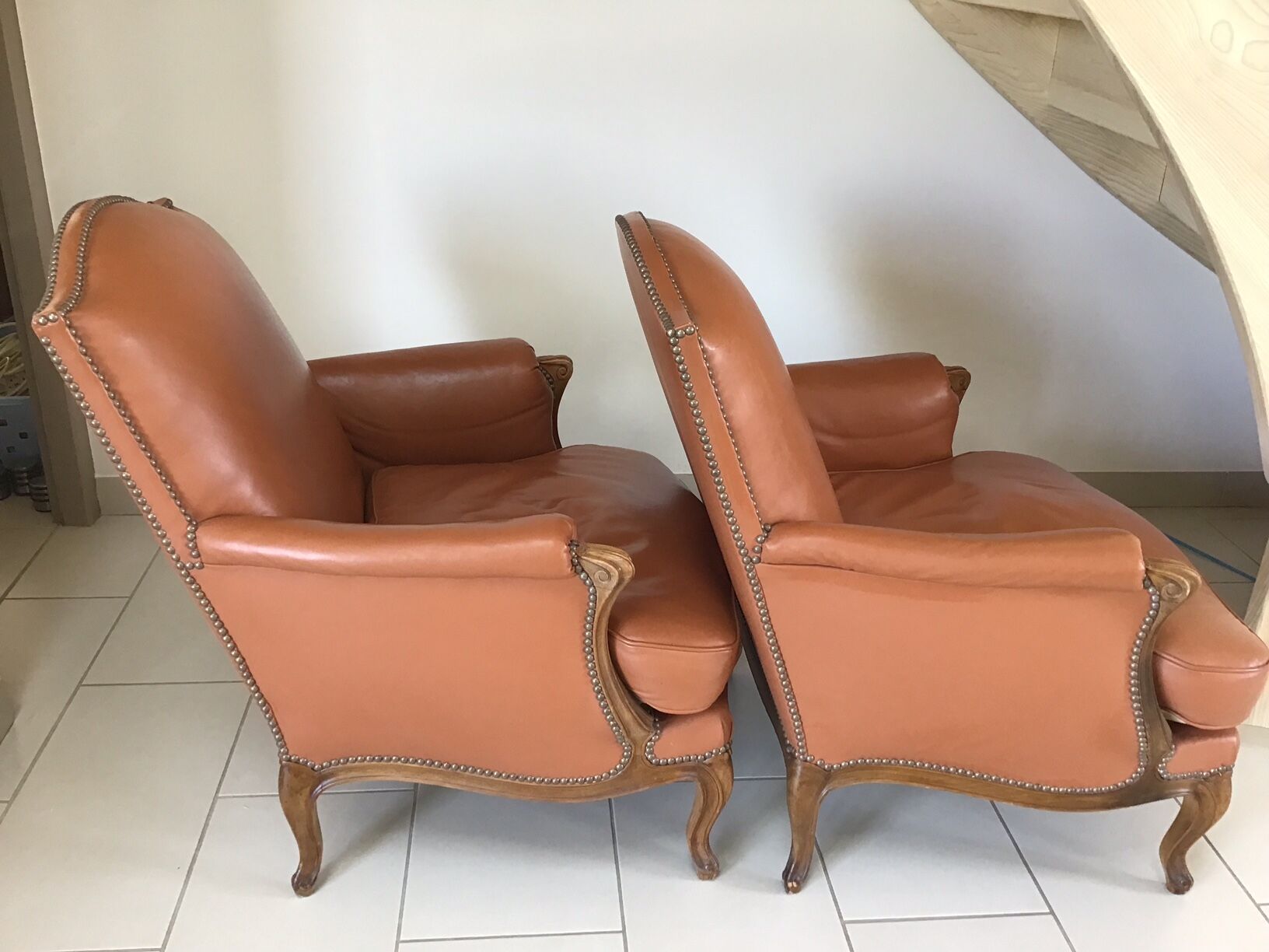 Louis VX style leather armchairs