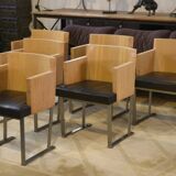 Set of 6 designer armchairs in oak and leather from the 1980s.
