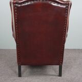 Patinated sheepskin armchair