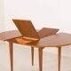 Scandinavian round teak table with hidden extension, 1970s