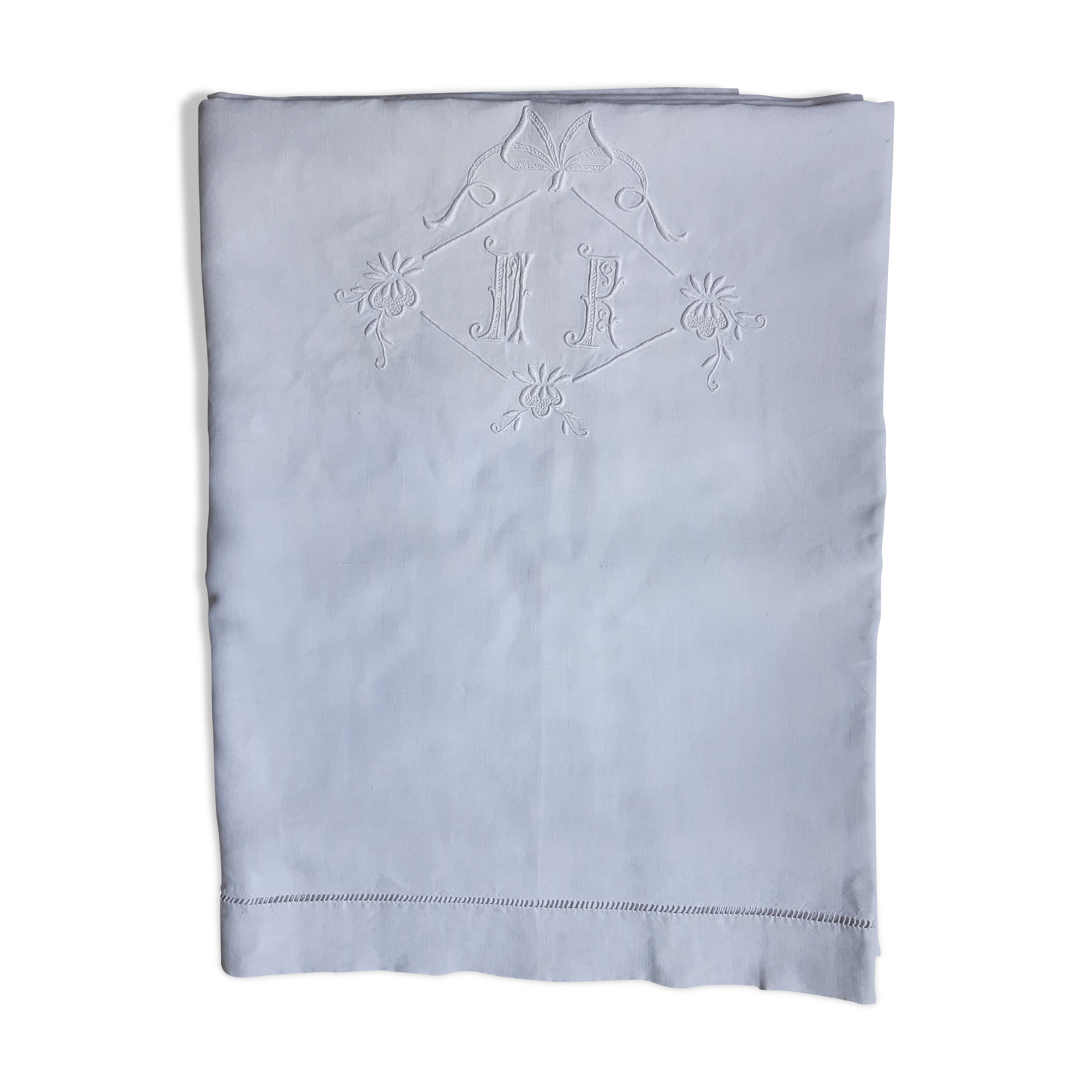 Fine linen sheet with ribbon and florets, monogrammed mr