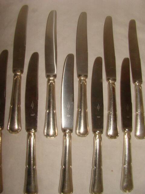 12 table knives with trilobate handles by the brand "G.Vivier"