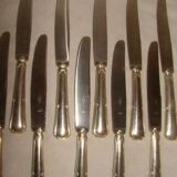 12 table knives with trilobate handles by the brand "G.Vivier"