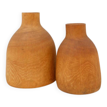 Pair of vintage decorative vases made of paulownia wood.