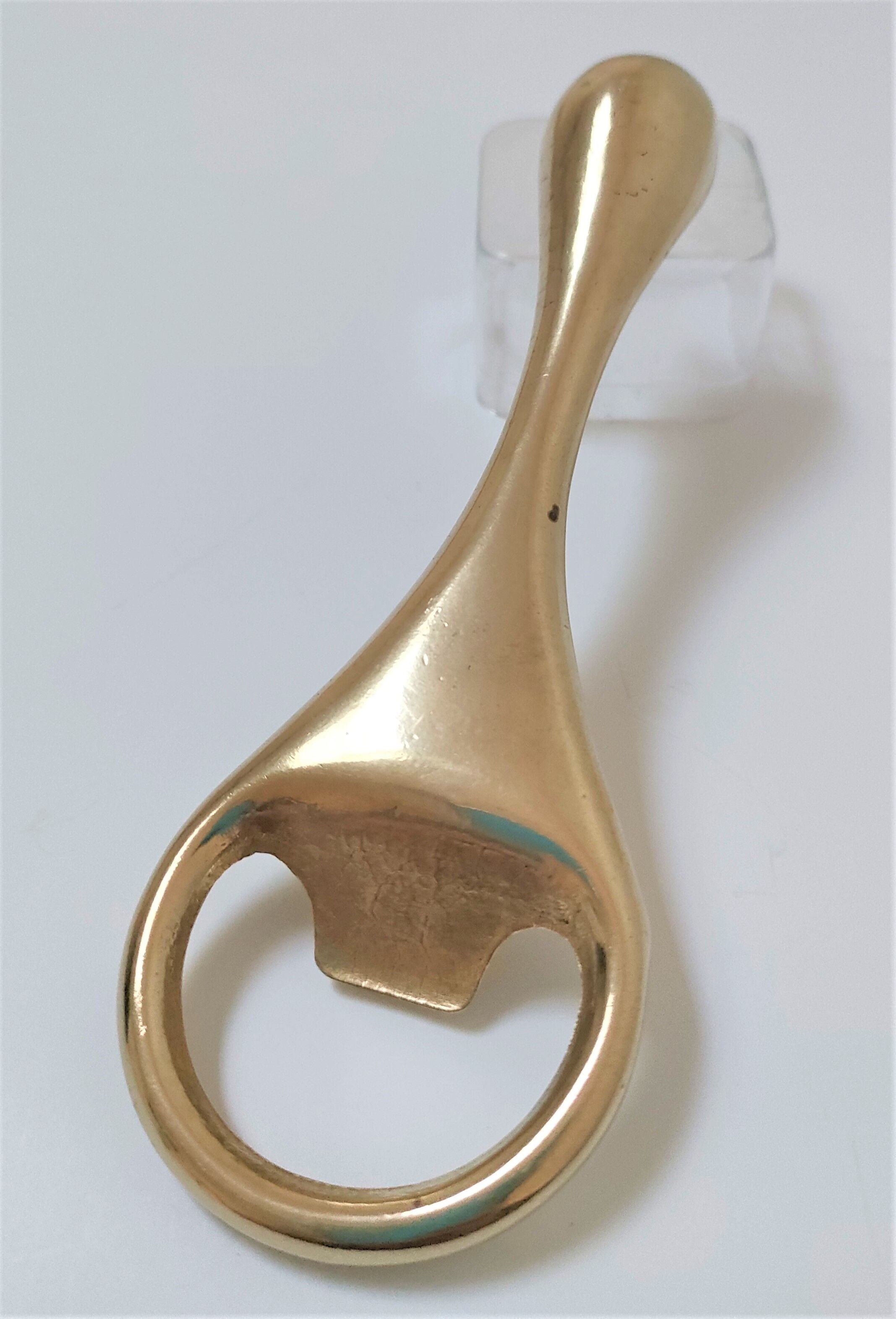 Modernist solid brass bottle opener by Carl Auböck