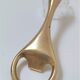 Modernist solid brass bottle opener by Carl Auböck