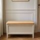 Re-enchanted vintage toy chest in beige, wooden tray.