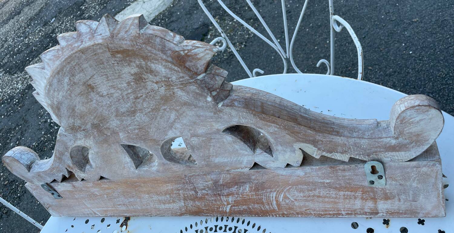 Raw carved wood coat rack