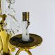 Bronze wall light with rococo style Louis XV pendants.