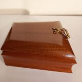 Box of cigars and mahogany cigarettes