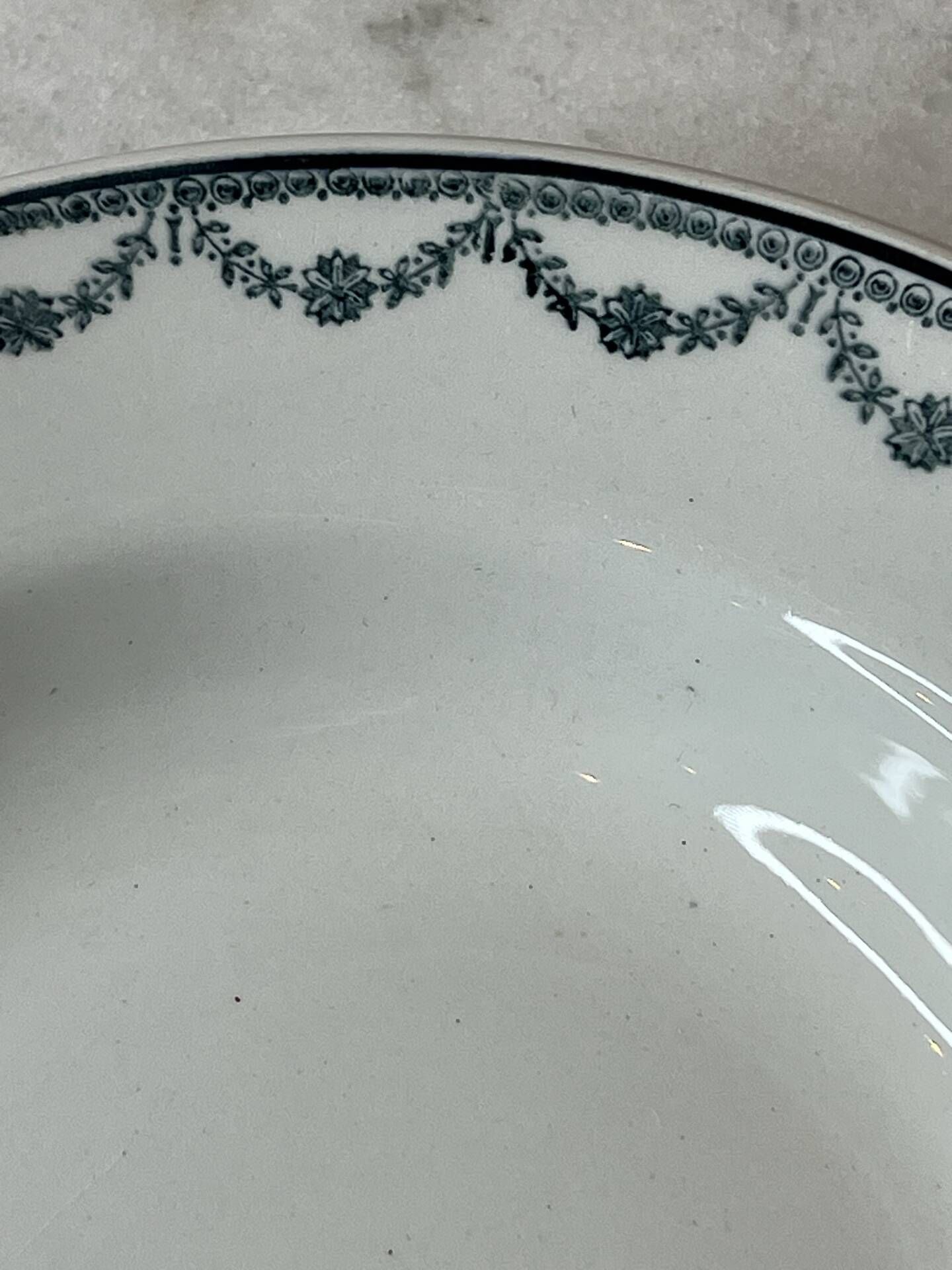 Set of 6 deep plates Saint Amand with floral garland decoration.