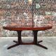 Large vintage Baumann table in rosewood with extensions, antique furniture.