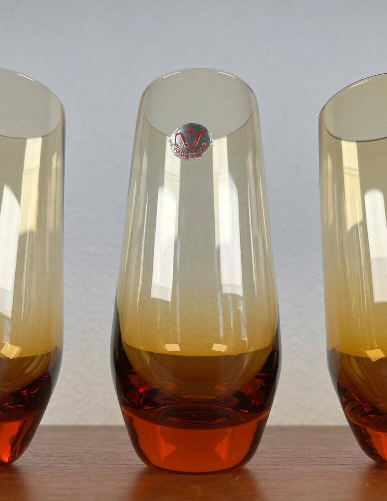 Amber glass carafe from the mid-century German Jagdhaus series and drinking glasses by Wilhelm Braun-Feldweg for Hirschberg, 1960s, set of 7.