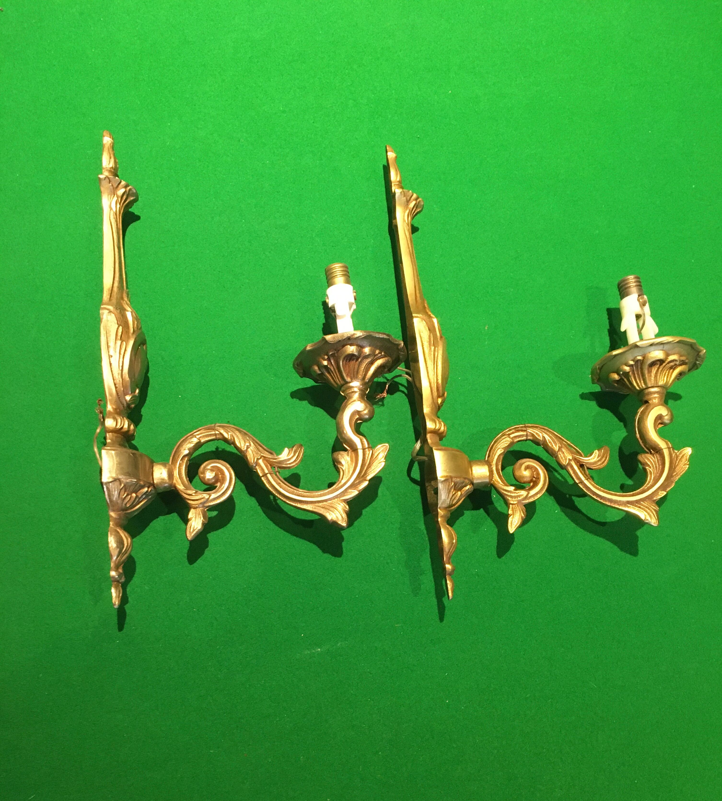 Pair of bronze wall lamps