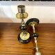 Pair of Napoleon III candlesticks in brass and black marble.