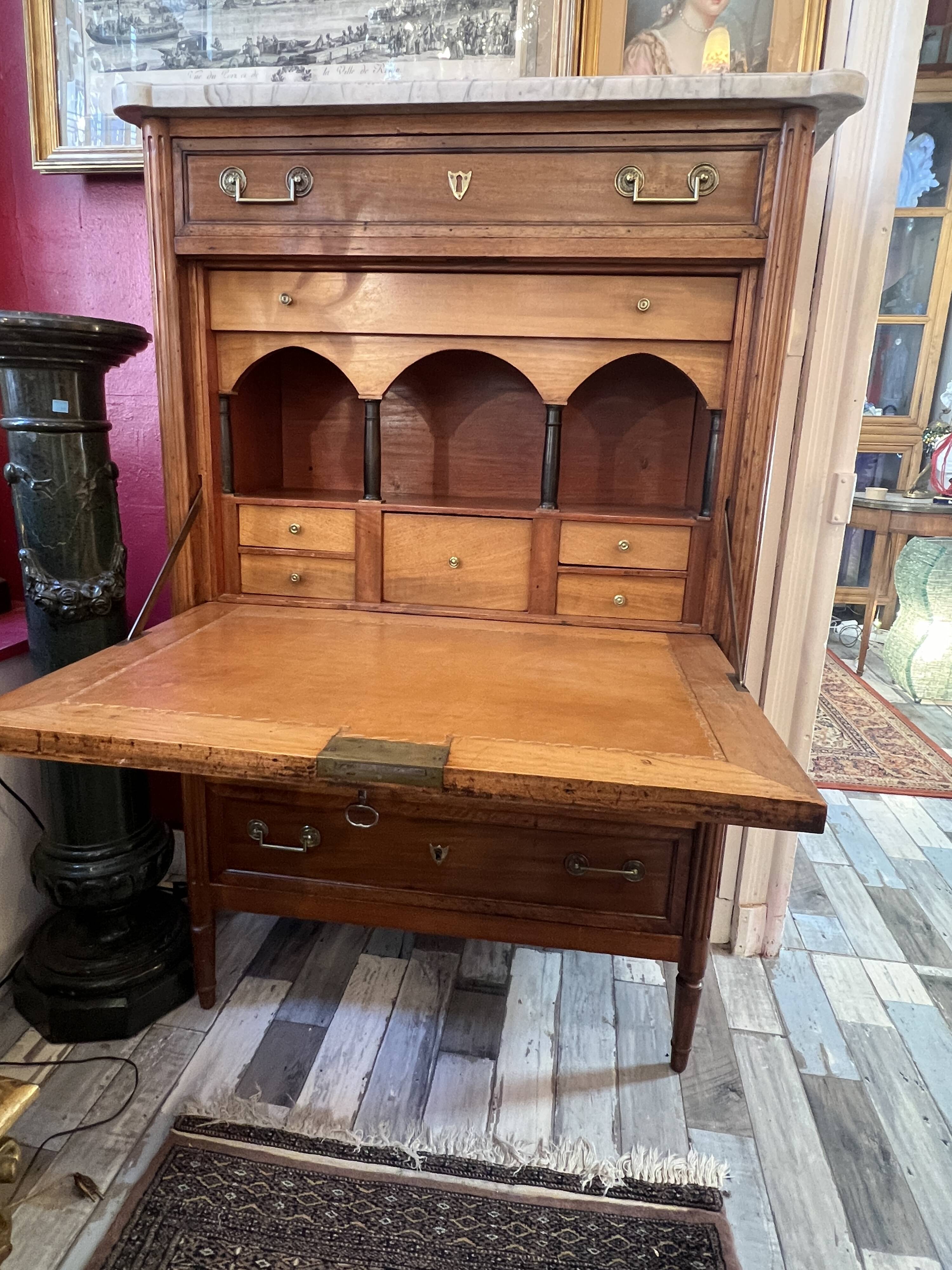 Louis XVI period mahogany secretary, white marble top, clover lock