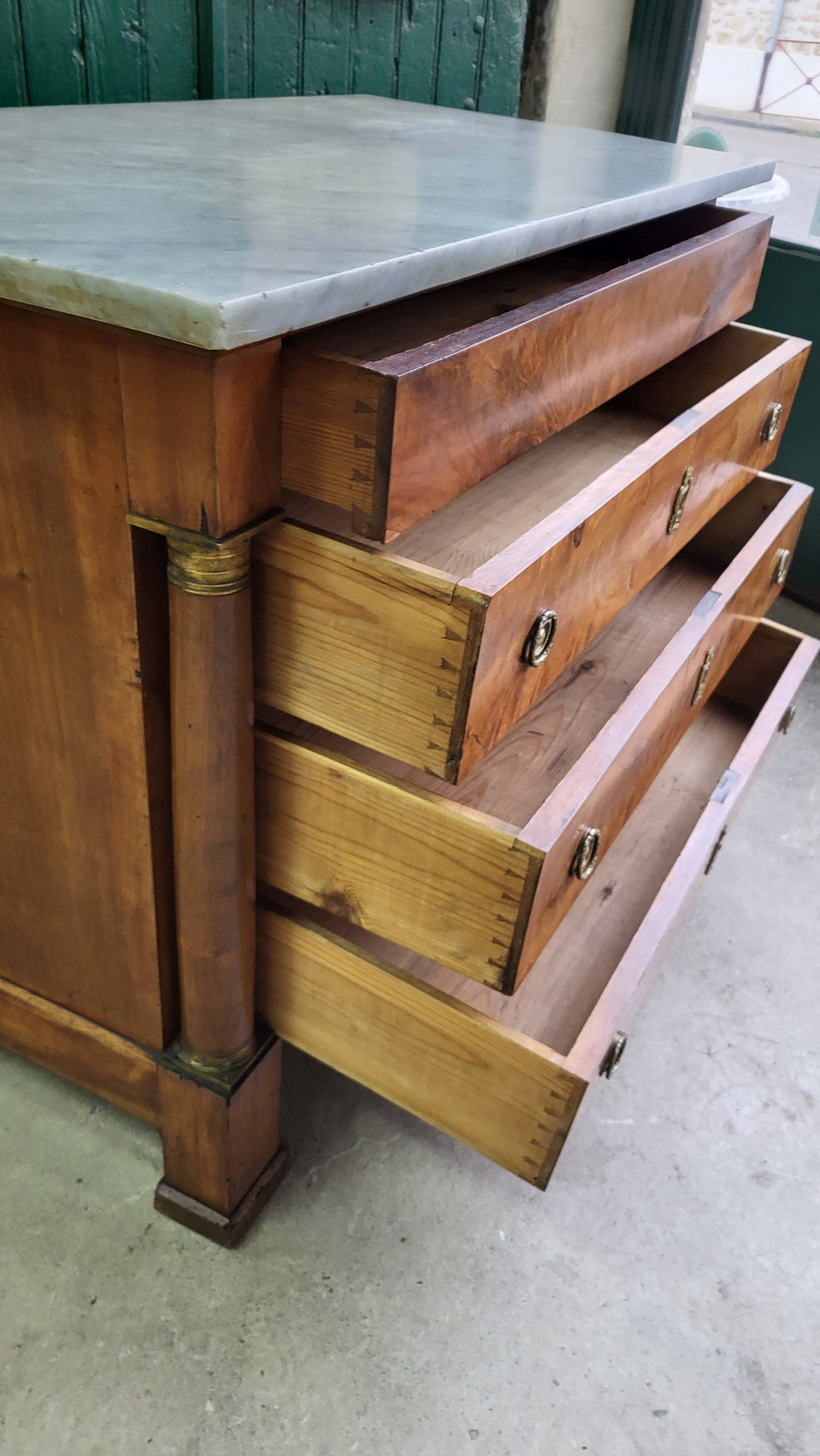 Empire commode in walnut with white marble top from the 19th century